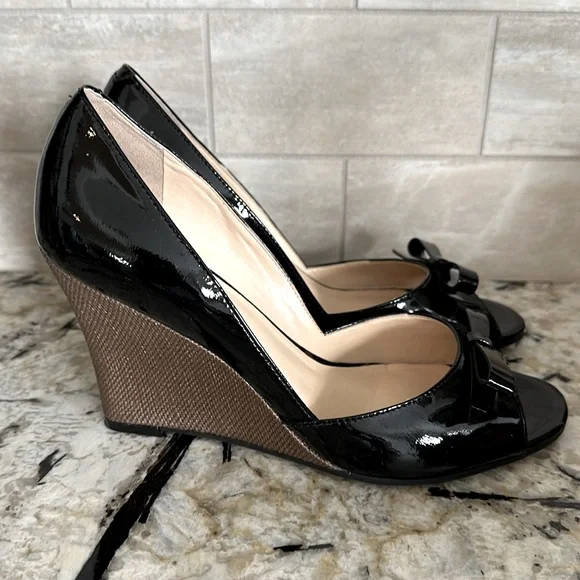 Black patent upscale shoe. Desirable 3 1/2 inch wedge.  Size 7 1/2  M - Picture 3 of 4